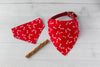 White Bones on Red Paws Dog Bandana shown with collar